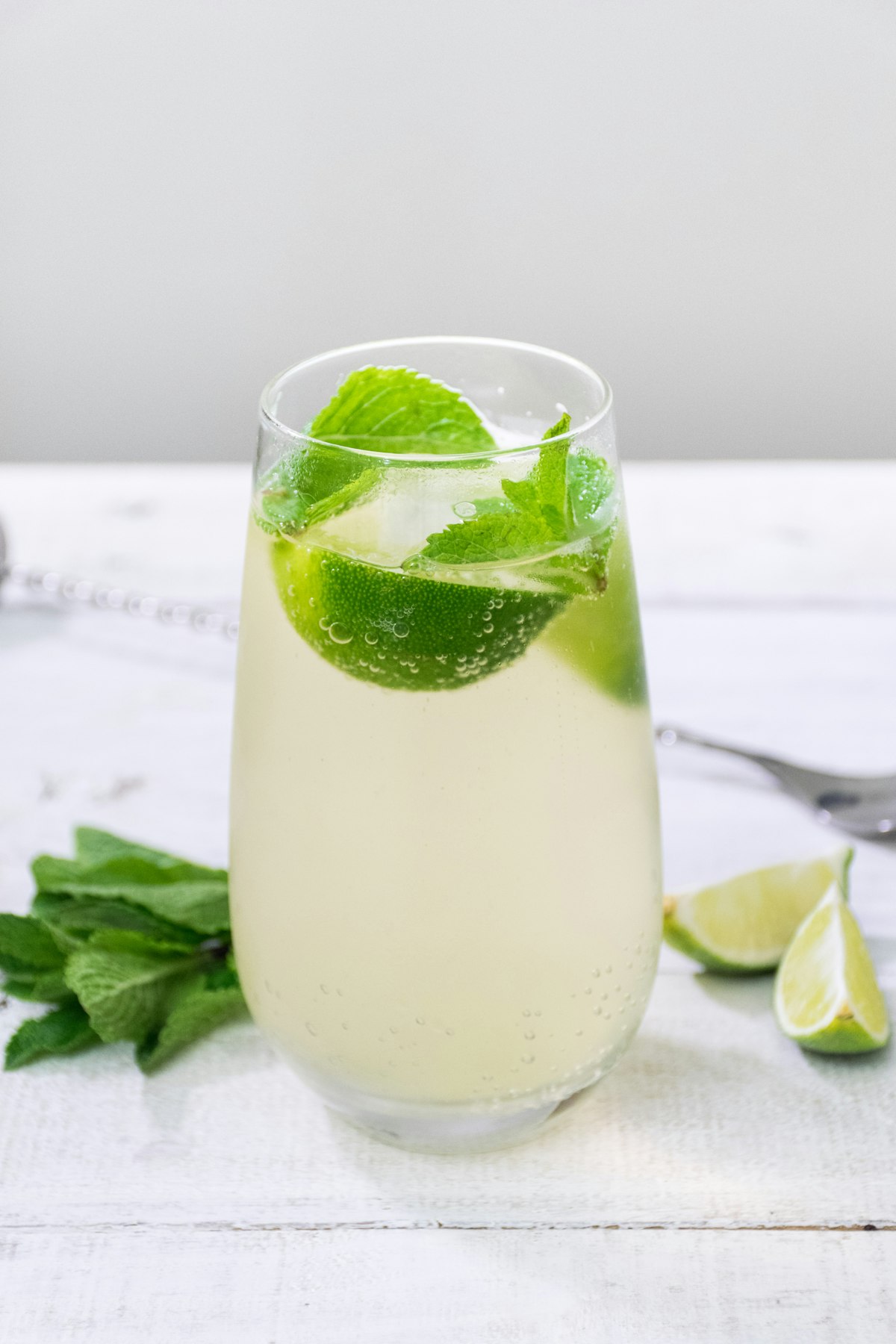 Green smoothie drink on a sunny morning table