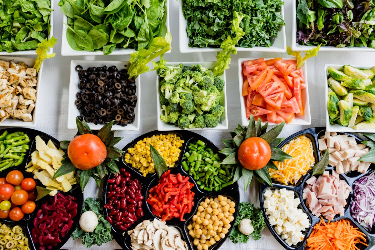 Mediterranean food spread with fresh vegetables and greens