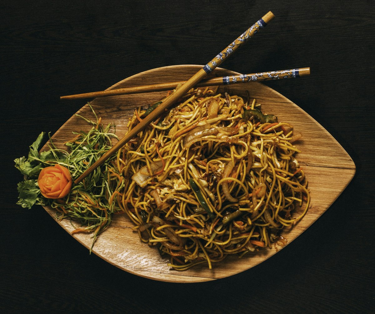 Close-up of kale leaves on dark background representing how lutein, zeaxanthin, quercetin, and vitamin C in kale protect eyes from blue light and screen fatigue