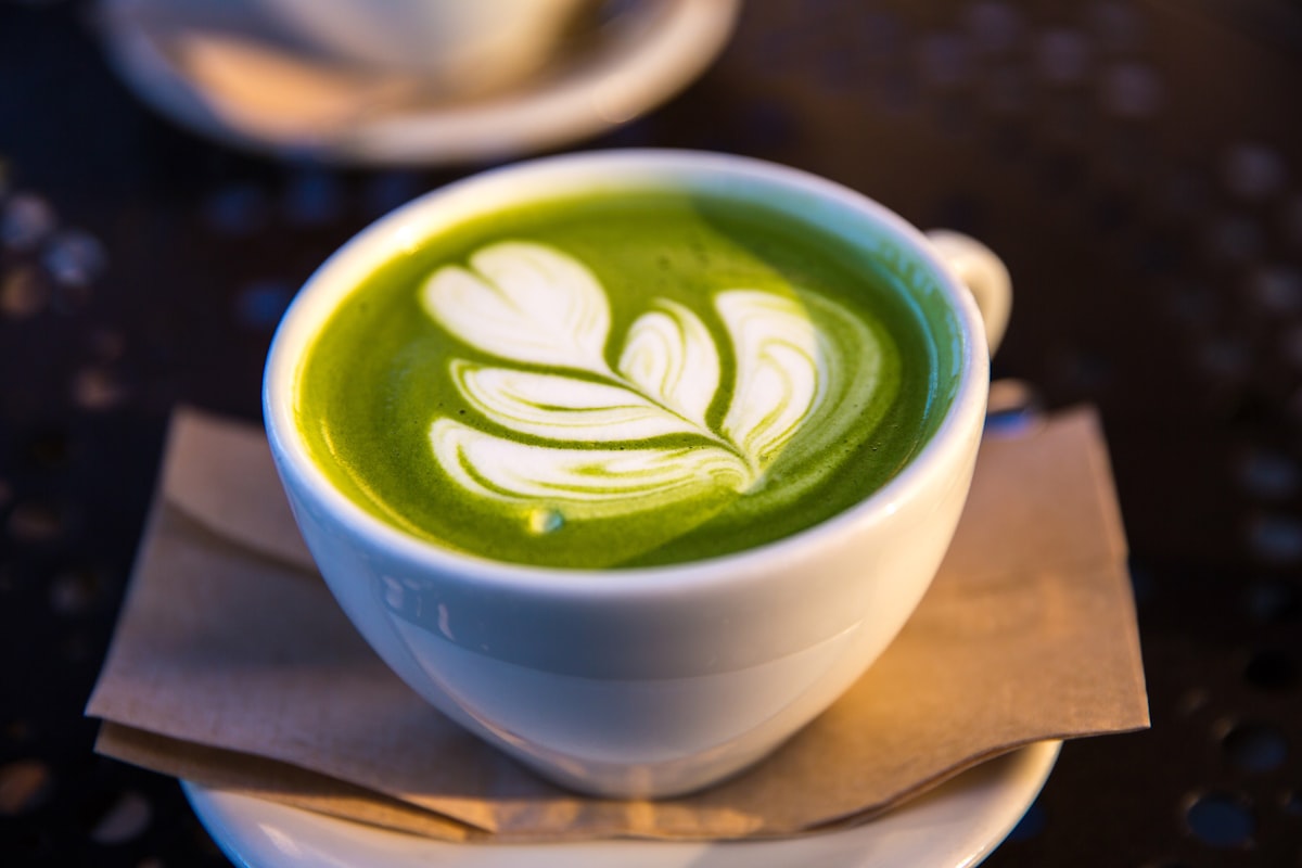 Green matcha and kale powders side by side
